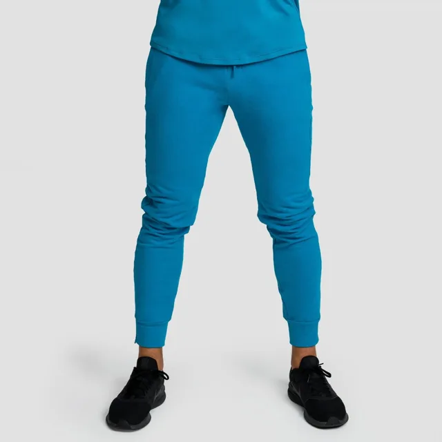 GymBeam Tepláky Limitless Aquamarine