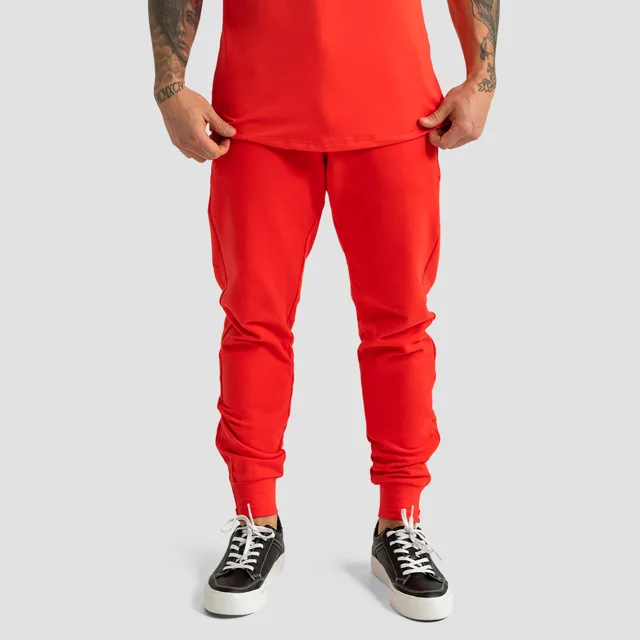 GymBeam Tepláky Limitless Hot Red